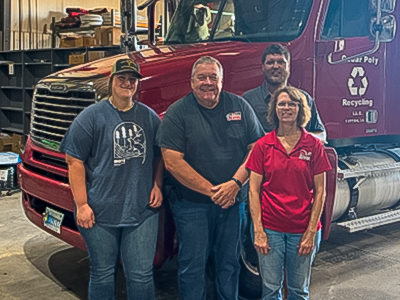 Ali Harper, standing with internship hosts at RPM Revival in Tipton